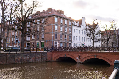 Old town in gdansk. the riverside on granary island reflection in moltawa river cityscap. ancient