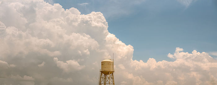 Low angle view of water tower against sky