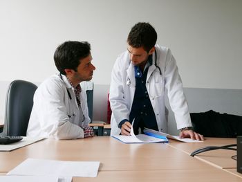 Doctors discussing in hospital