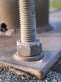 Detail of bolts. steel plate based on anchor bolts on the concrete pillar.