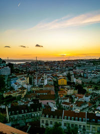 High angle view of townscape against sky during sunset