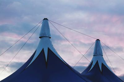 Low angle view of cables against sky