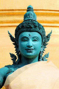 Low angle view of buddha statue