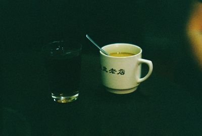 Close-up of coffee cup on table