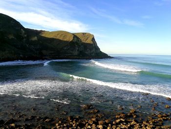 Scenic view of sea against sky, a hidden bay. 