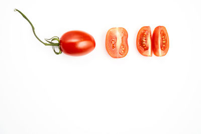 Directly above shot of fruits against white background