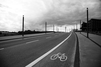 Empty road against sky