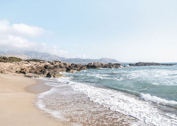 Scenic view of beach against sky
