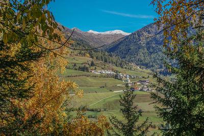 Scenic view of landscape against sky during autumn