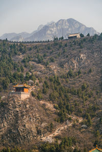 Scenic view of landscape and mountains against sky