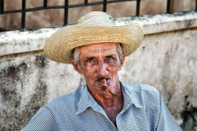 Portrait of man wearing hat outdoors