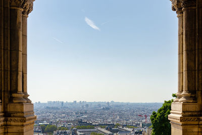 Buildings in city against sky