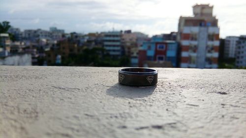 Close-up of retaining wall against sky