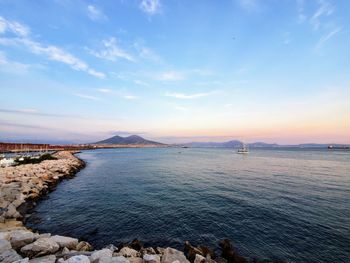 Scenic view of sea against sky during sunset