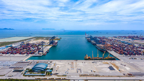 Shipping port logistics cargo transportation import export international open sea aerial view 