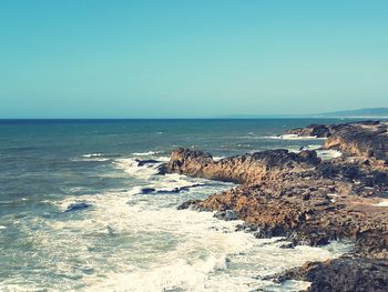 Scenic view of sea against clear sky