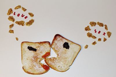 Close-up of heart shape on white background