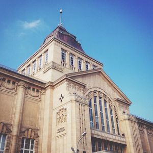 Low angle view of church against blue sky