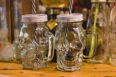 Close-up of glass jar on table