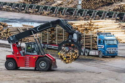 Logging vehicle carrying timber