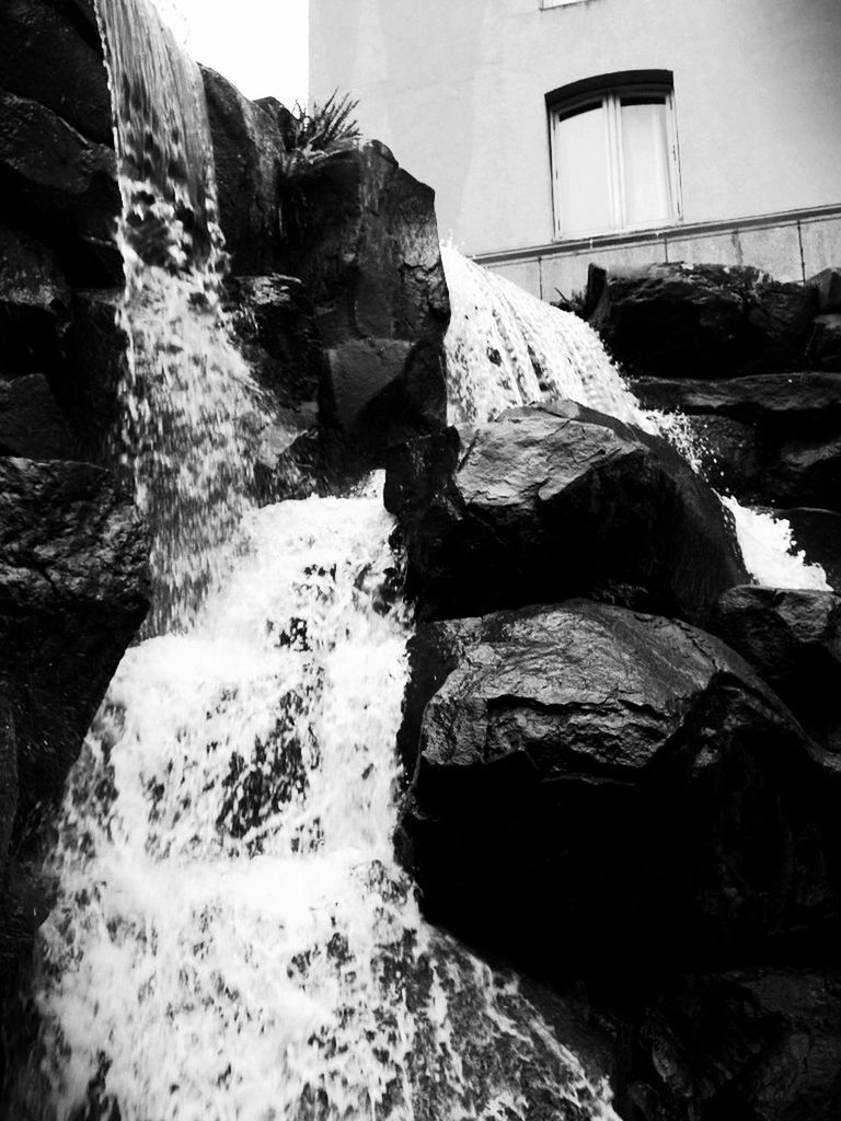 water, rock - object, built structure, architecture, waterfront, building exterior, house, rock formation, nature, sea, day, rock, no people, outdoors, river, flowing water, beauty in nature, motion, tranquility, sunlight