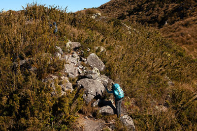 Man standing on rock