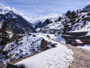 Scenic view of snowcapped mountains against sky