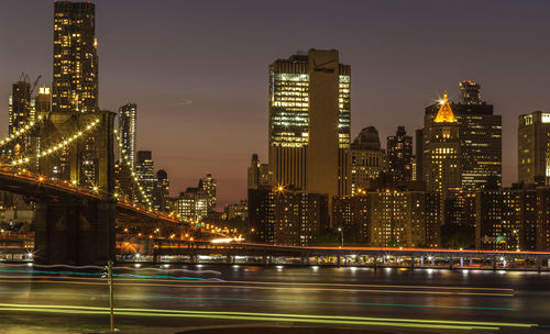 Illuminated buildings in city at night