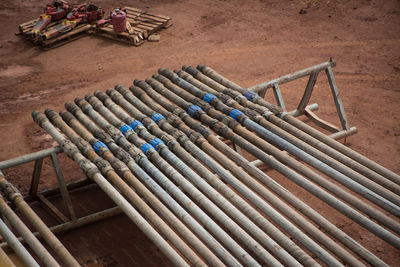 High angle view of metal container on wood