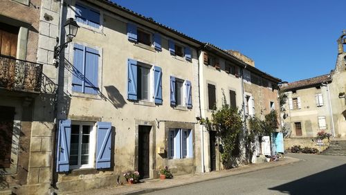 Residential buildings against clear sky