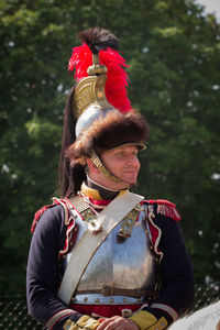 Portrait of man wearing hat standing outdoors