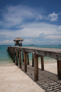 Pier over sea against sky