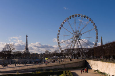 View of ferris wheel in city