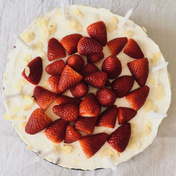 High angle view of strawberries in plate on table