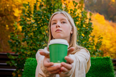 Young woman using mobile phone