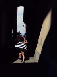 Rear view of little girl on the street 