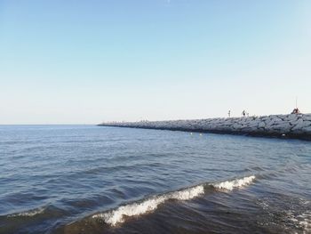 Scenic view of sea against clear sky