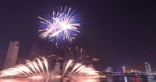 Firework display at night