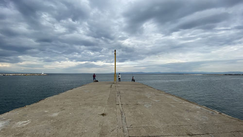 Pier on sea against sky