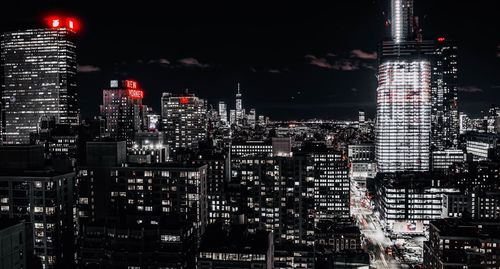 Illuminated buildings in city at night