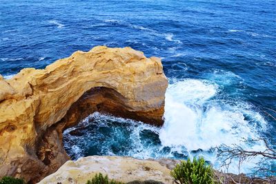 High angle view of rock formation in sea