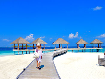 Woman on beach at maldivian paradise