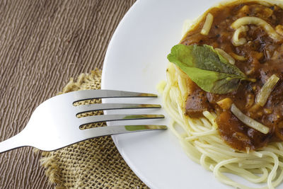 High angle view of pasta in plate on table