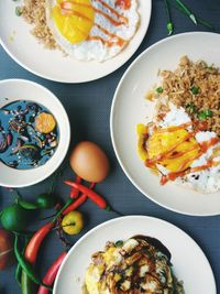 High angle view of food in plates on table