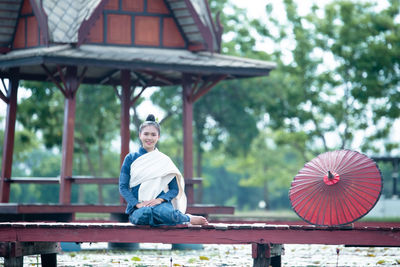 Portrait of man sitting outdoors