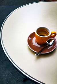 High angle view of coffee cup on table