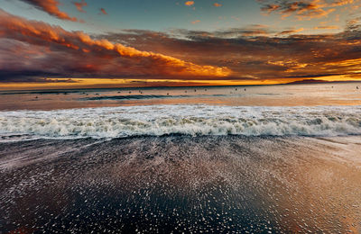 Scenic view of sea against sky during sunset