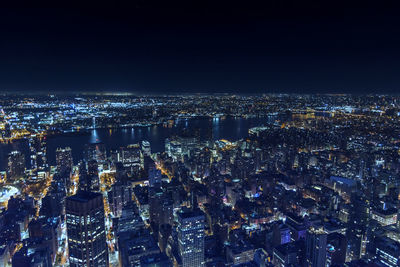 Illuminated cityscape at night