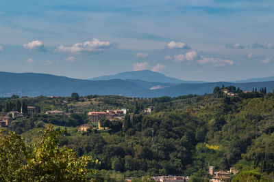 Scenic view of townscape against sky