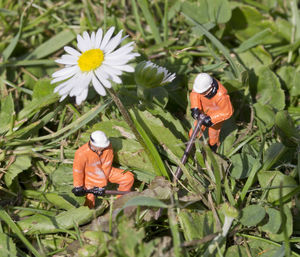 High angle view of workmen figurines at work